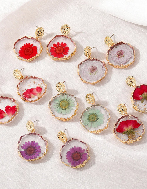 Load image into Gallery viewer, Handmaking Epoxy Resin Earrings With Flower Inside Unique Pressed Flower Earring Elegant Irregular Round Earrings Wholesale 2024
